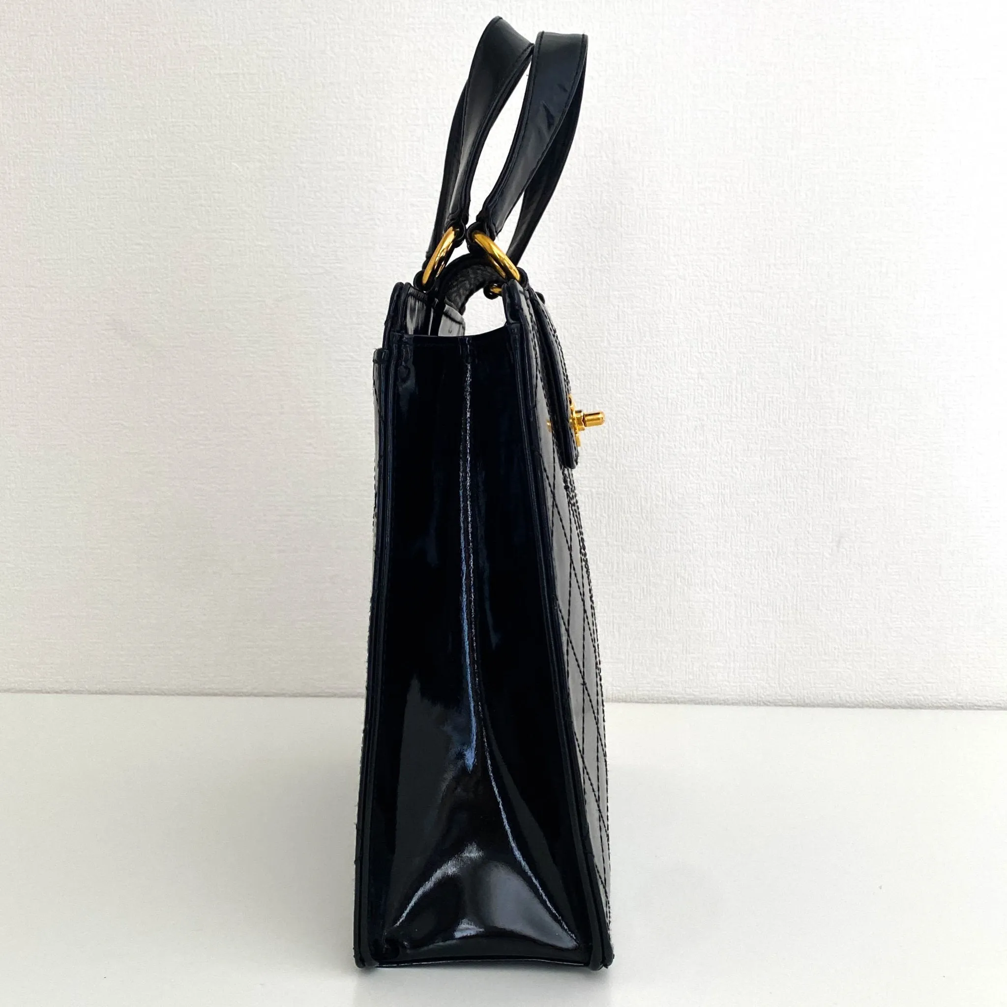 CC Turnlock Patent Hand Bag