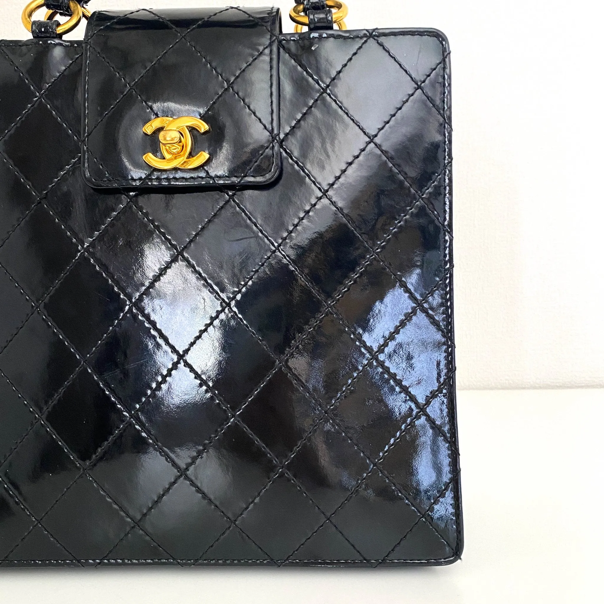CC Turnlock Patent Hand Bag