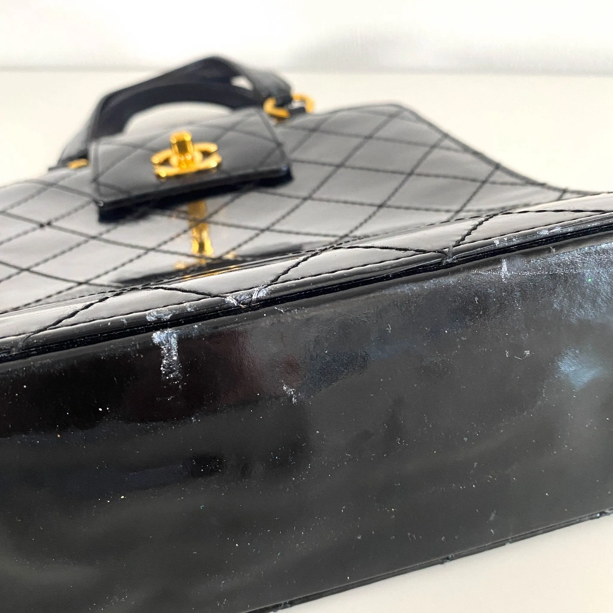 CC Turnlock Patent Hand Bag