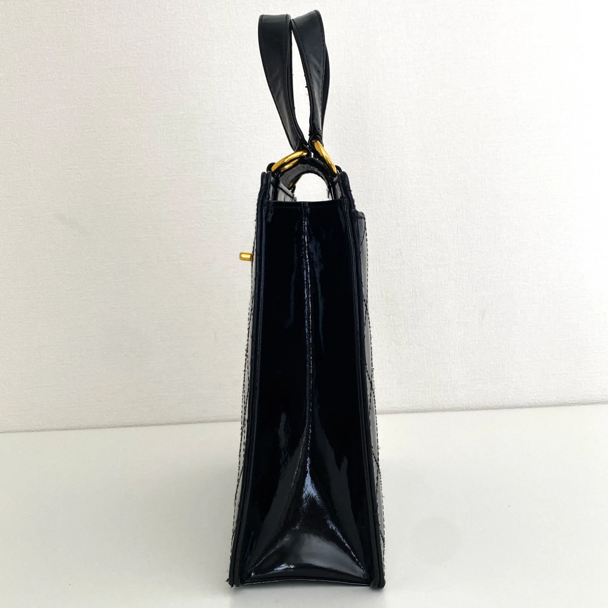 CC Turnlock Patent Hand Bag