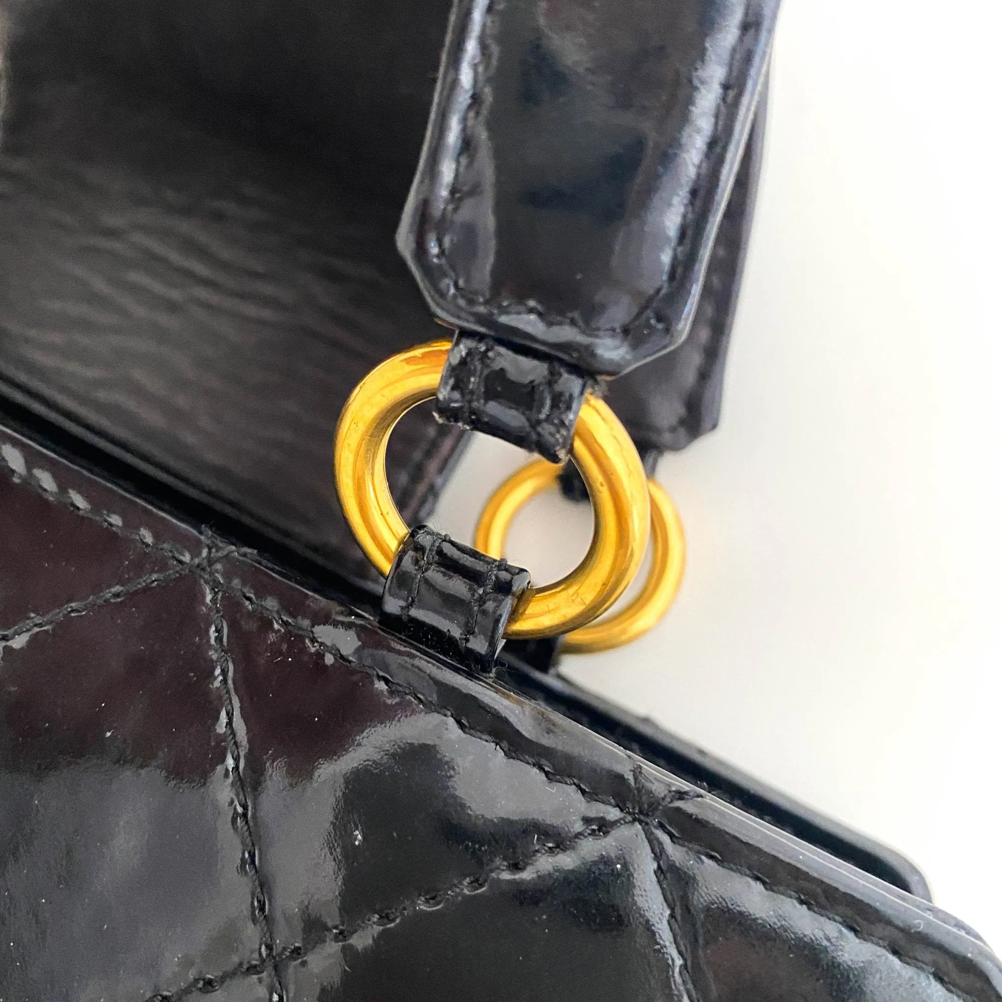 CC Turnlock Patent Hand Bag