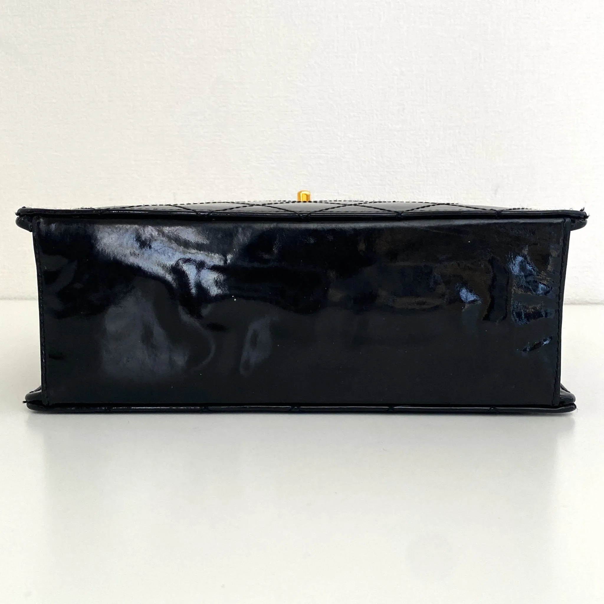 CC Turnlock Patent Hand Bag