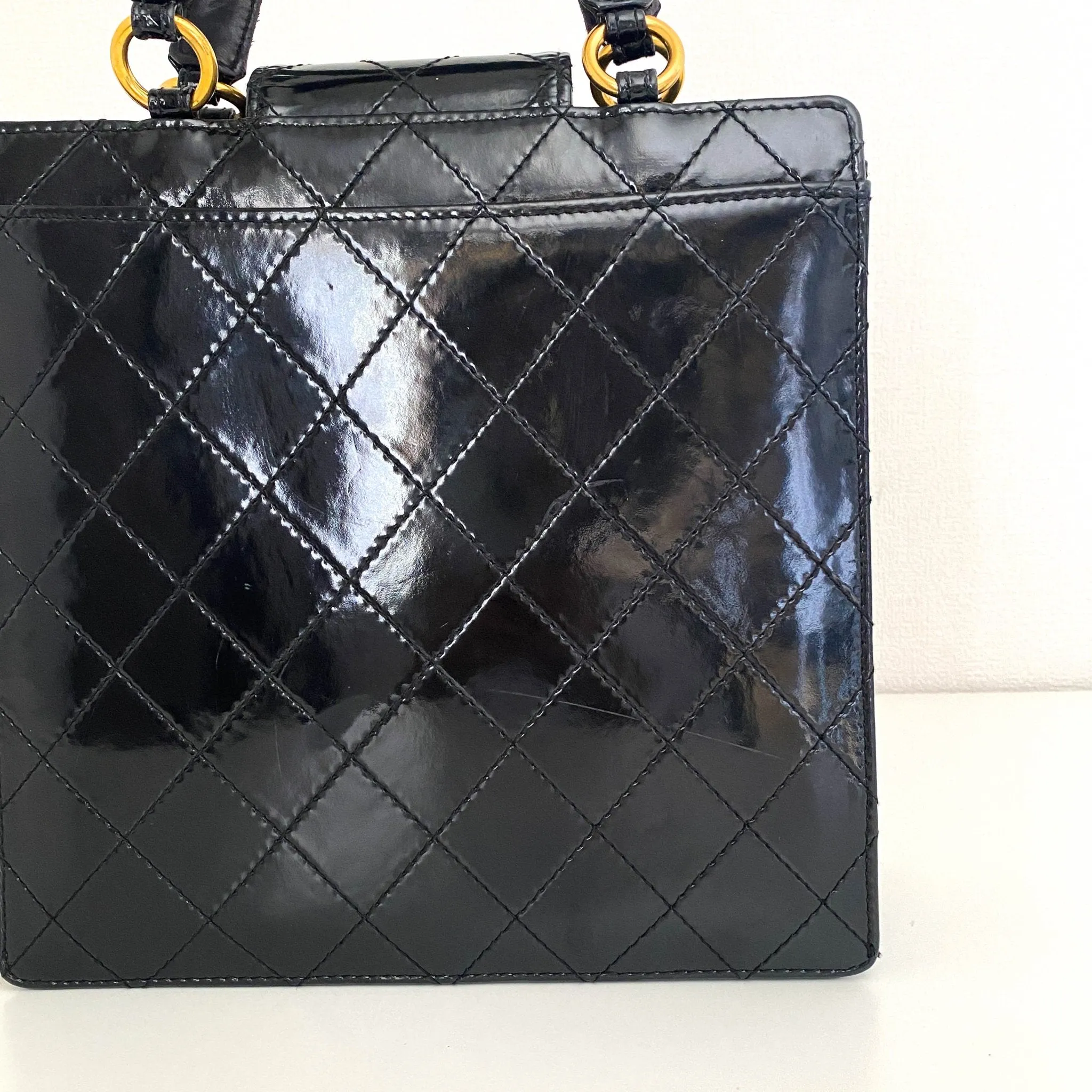 CC Turnlock Patent Hand Bag
